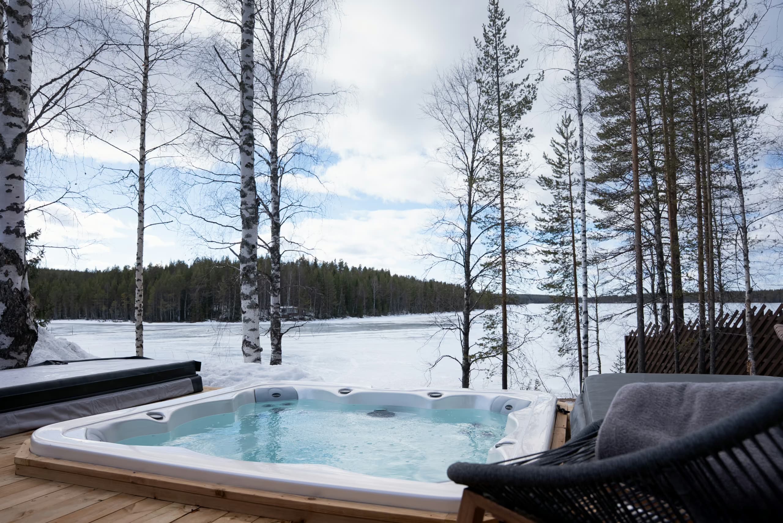 Lakeview jaccuzi in winter at Aito Resort